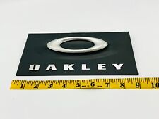 OAKLEY LOGO ICON DISPLAY PLATE STORE DISPLAY CASE RARE 9 INCHES SIGN  X-METAL picture