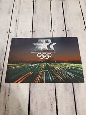 Postcard - LA Skyline Time lapse Los Angeles 1984 Olympics Unused  picture