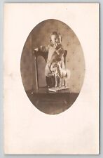 RPPC Cute Little Child And  Antique Horse Pull Toy On Chair c1907 Postcard A49 picture