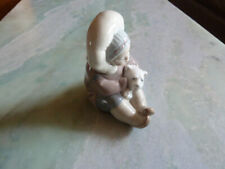 LLADRO ESKIMO PLAYING picture