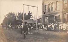 J33/ Sauk City Wisconsin RPPC Postcard c1910 High Wire Act Man Chair Crowd 293 picture