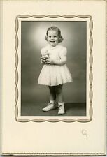 Antique Photo in Folder - Little Girl Holding Plastic Doll W/ Big Smile picture