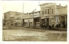 ATKINSON NEBRASKA E MAIN ST 1912 RPPC POSTCARD MCNICHOLS MARKET WILSON DRUG BANK picture