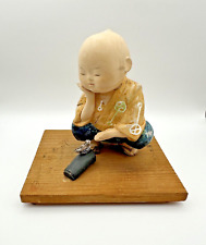 VTG Hakata Doll Unglazed Hand Painted Boy & Bird Figurine ~ Signed Wooden Base picture