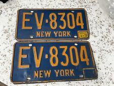 ORIGINAL 1960s / 70s NY LICENSE PLATE PAIR EV 8304 picture