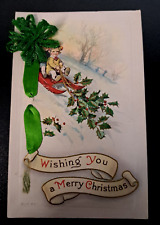 Antique 1916 Christmas Postcard HTF Children Sleigh Holly with Green Ribbon Bow picture