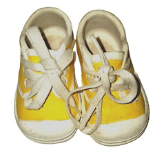 Vintage Pair of Yellow Ceramic Baby Bootie Sneaker Shoes with real strings picture