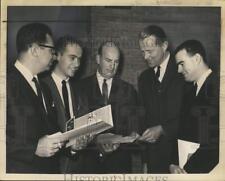 1966 Press Photo Store managers look over brochures for Colonie, New York mall picture