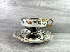 Vintage Ucagco Ceramics Japan Iridescent Teacup and Saucer Brown w/Yellow Roses picture