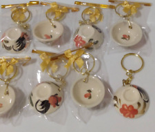 Lot of 8 Flower Bowl Keychains picture