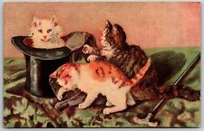 CATS ARTIST IMAGE OF 3 CATS PLAYING WITH TOP HAT, NISTER PUB  1909 picture