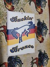 Bucking Bronco Sign Stamped Metal  picture