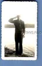 FOUND B&W PHOTO N+1784 SAILOR POSED SALUTING picture