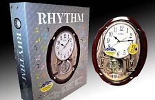 Vintage Rhythm Clock Musical Motion Clock 4MJ427 - 30 Melodies picture