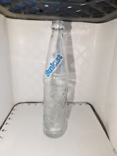 Vintage Glass 16 Ounce Embossed Sunkist Soda Pop Bottle picture