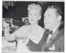 Serge Rubinstein and Betty Reed Making to a Toast 1955 Photo picture