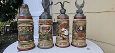 HARLEY-DAVIDSON THE V-TWIN AN AMERICAN TRADITION SET OF FOUR GERMAN STEINS  picture