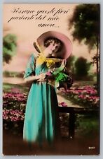 RPPC Postcard Fotocelere Beautiful Woman with Basket of Flowers Romantic Love picture