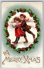 Merry Christmas Little Boy Girl Ice Skating Holly Wreath Embossed Postcard 1912 picture