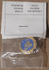 Vintage UN pin in package(Switzerland). picture
