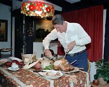 PRESIDENT RONALD REAGAN CARVES A TURKEY IN NOVEMBER, 1981 - 8X10 PHOTO (FB-344) picture