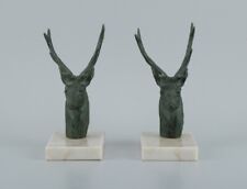 A pair of French Art Deco bookends. Stags in patinated metal on a marble base. picture
