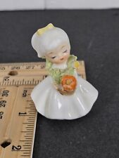 VINTAGE NAPCO MINIATURE BONE CHINA FLOWER GIRL OF MONTH WITH SPAGHETTI TRIM Cute picture