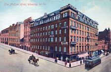 WHEELING WV -The McLure Hotel Showing Horse Drawn Carriages And Trolley Postcard picture
