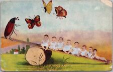 Vintage 1910s FANTASY Greetings Postcard Babies on Log See-Saw / Butterflies picture