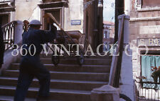 Vintage 1963 Kodachrome 35mm photo slide man wheeling cheese & meat in Italy picture