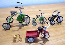 Three vintage Hallmark Keepsake Tricycle ornaments, plus extras. picture