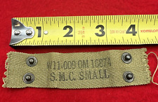 WWII/2 US M-1 helmet liner NOS nape strap marked S.M.C. Small. picture