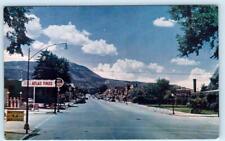 CEDAR CITY, Utah UT ~ Street Scene EL ESCALANTE HOTEL Atlas Tires 1960s Postcard picture