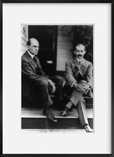 1909 photograph of Wilbur Wright and Orville Wright seated on steps of rear porc picture