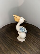 Pelican Sitting On Shell picture