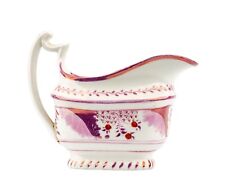 An Antique Lusterware Floral Decorated Gravy Boat picture