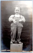 Postcard RPPC Happy Chubby Boy In Bib Overalls Wearing Ring Studio Photo R22 picture