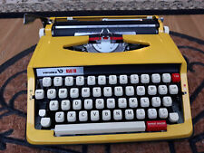 Beautifull lemon yellow Vendex vintage portable manual typewriter with case picture