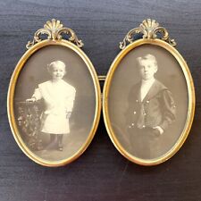 Antique Brass Hanging Oval Double Picture Frame With Original Photographs picture