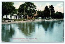 1908 North Beach Shawano Lake Side Cabin Boat Shawano Wisconsin Posted Postcard picture