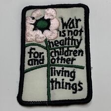VINTAGE Anti-war Peace WAR IS NOT HEALTHY Pink Flower Sew On Patch NEW picture