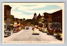 Huntsville Canada, Main Street, Shops, Clock Tower, 1940's Cars Vintage Postcard picture