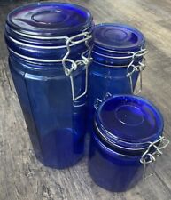 Vintage Cobalt Blue Glass Canister Set Of 3 Assorted Sizes Bail and Trigger Lids picture