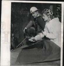 1956 Press Photo Actress Madeleine Carroll works with Welder Stavros S. Miarchos picture