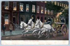 Pre-1908 GOING TO THE FIRE HORSE DRAWN TANKER FIREMEN (CREASED) ANTIQUE POSTCARD picture