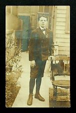 C.1910'S RPPC SEPIA PHOTO POSTCARD SCHOOL BOY IN TRADITIONAL CLOTHING UNIFORM  picture