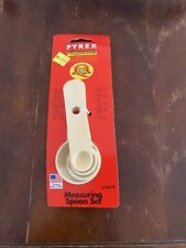 Vintage Pyrex Accessories Measuring Spoons Snap Together Set Of 4 Beige USA 2 picture
