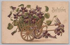 Greetings~Best Wishes~Cart Full Of Violets & Leaves~Purple Ribbon~PM 1919 PC picture