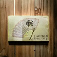 VTG Christmas Greetings Postcard with Handheld Fan & Portrait Early 20th Century picture