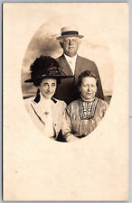 c1910 RPPC Real Photo Postcard Oval Portrait Women Striped Dress Man Hat picture